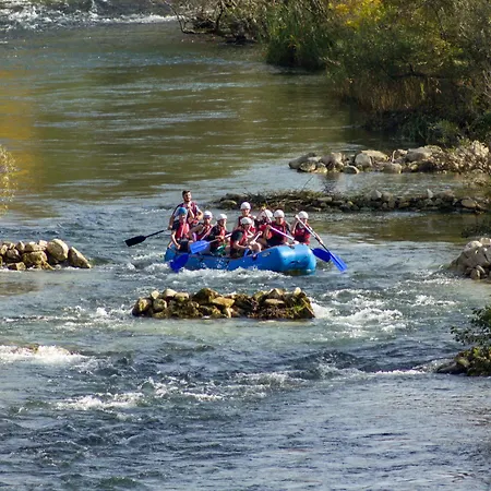 By The River אומיס