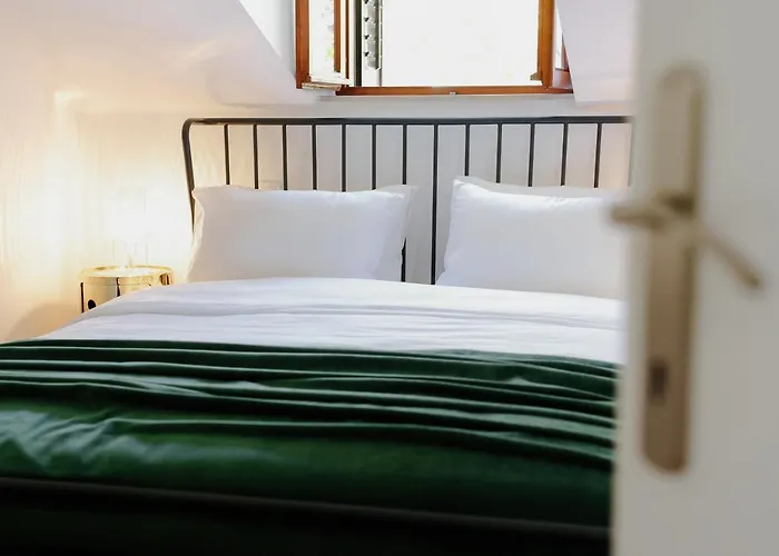 By The River Gæstehus